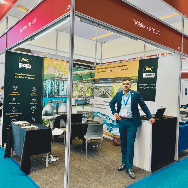 Tigernix CEO posing at the Indowater Booth (J09)